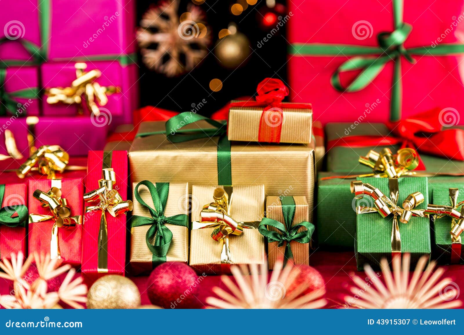 many christmas presents grouped by color