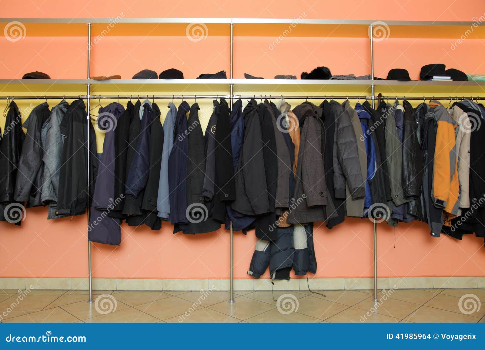 many clothes in cloakroom