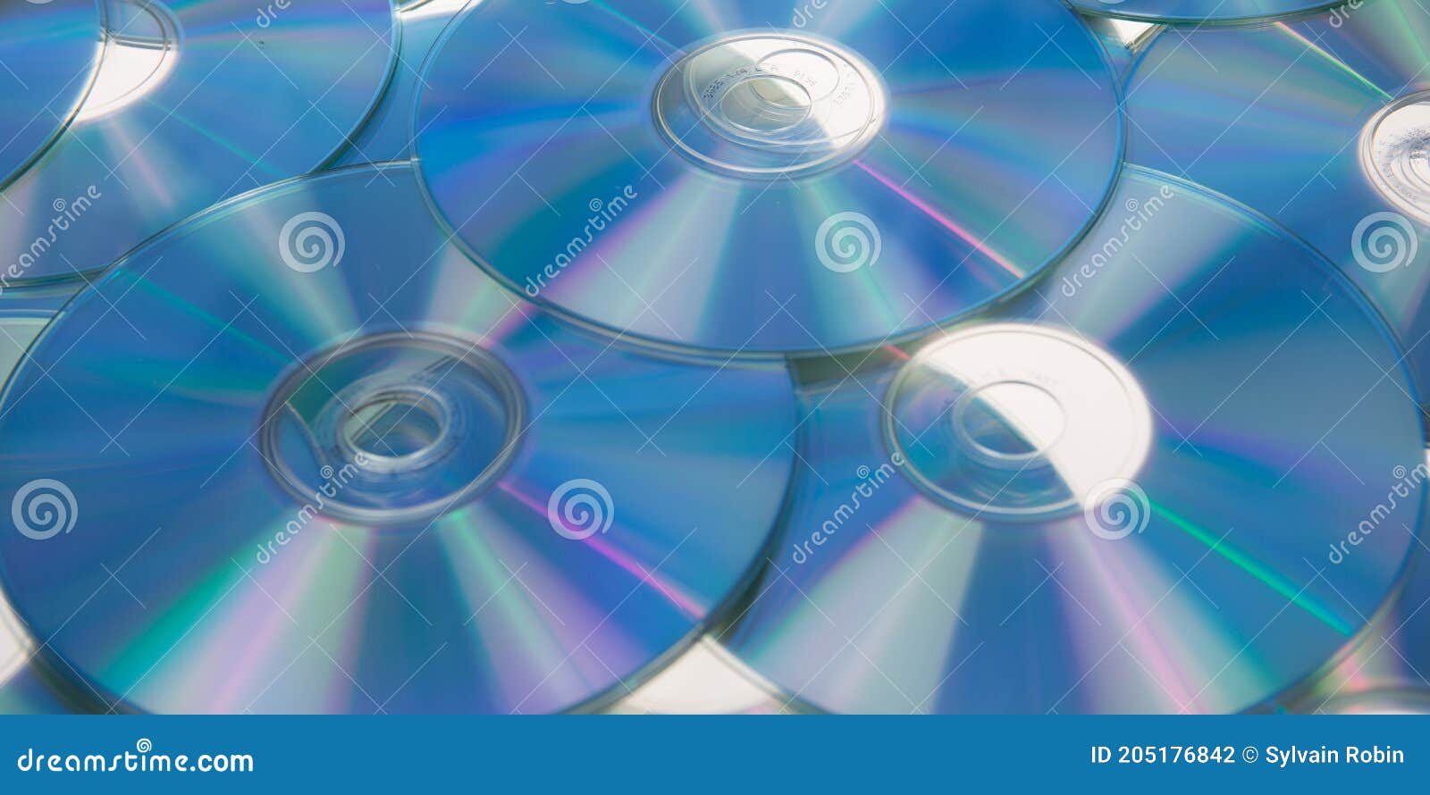 Many Compact Disc Blue Dvd Discs Cd or Dvd Background Stock Photo