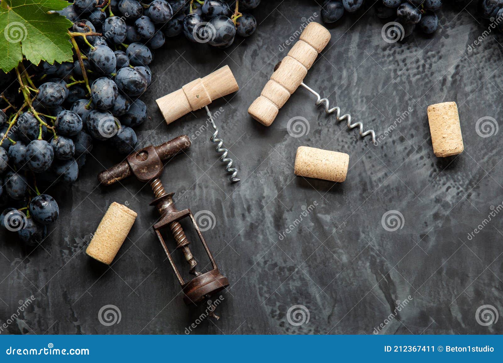 Many Different Corkscrews Varieties with Open Wine Corks on Dark