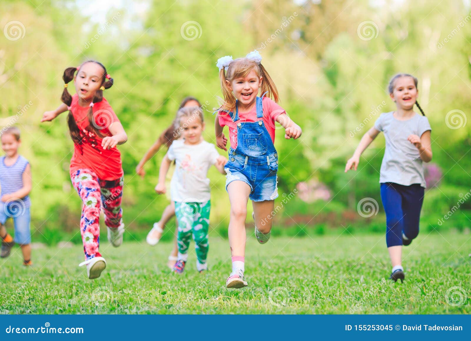 Many Different Kids, Boys and Girls Running in the Park on Sunny Summer ...