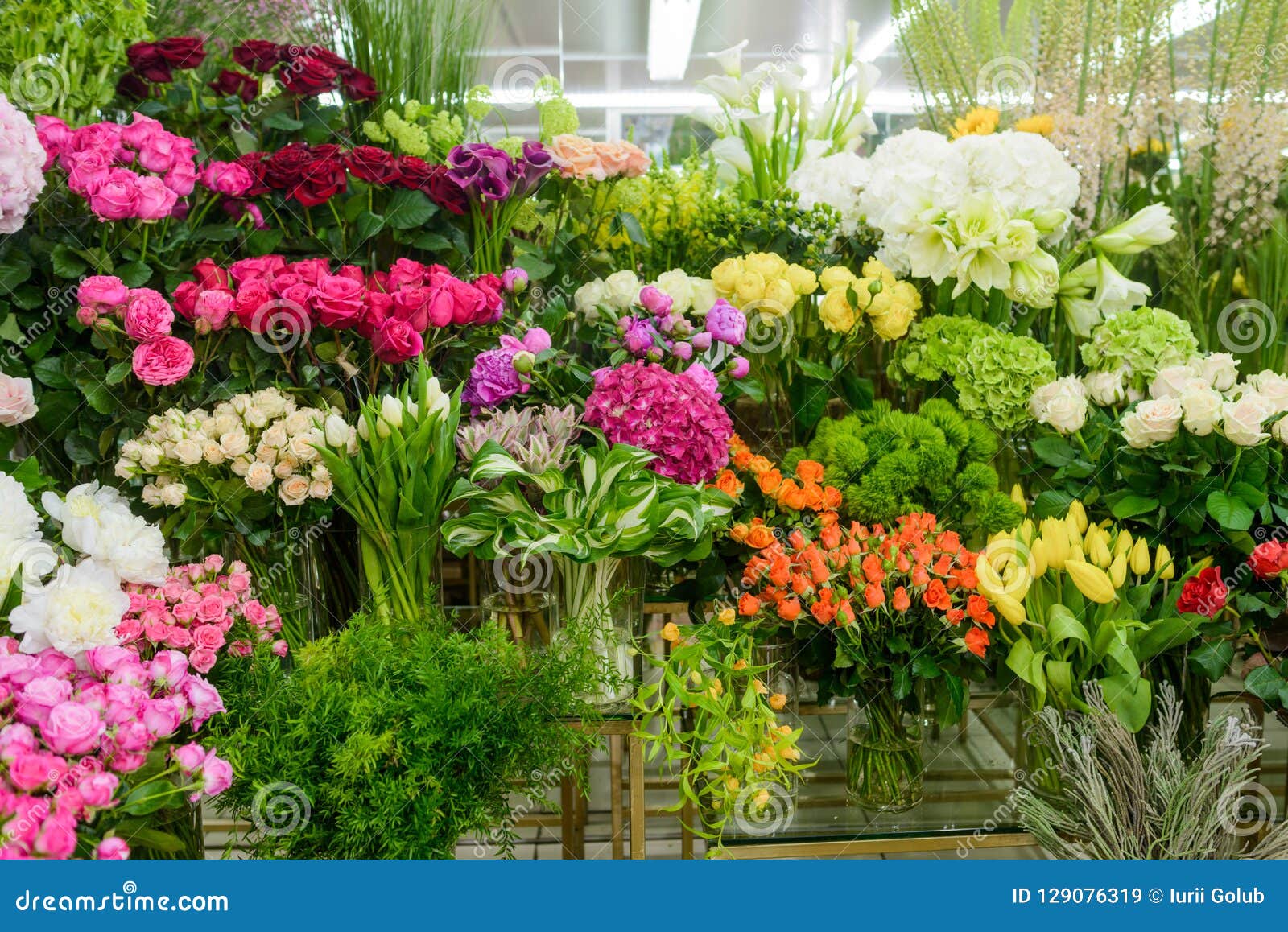 many flowers in florist shop