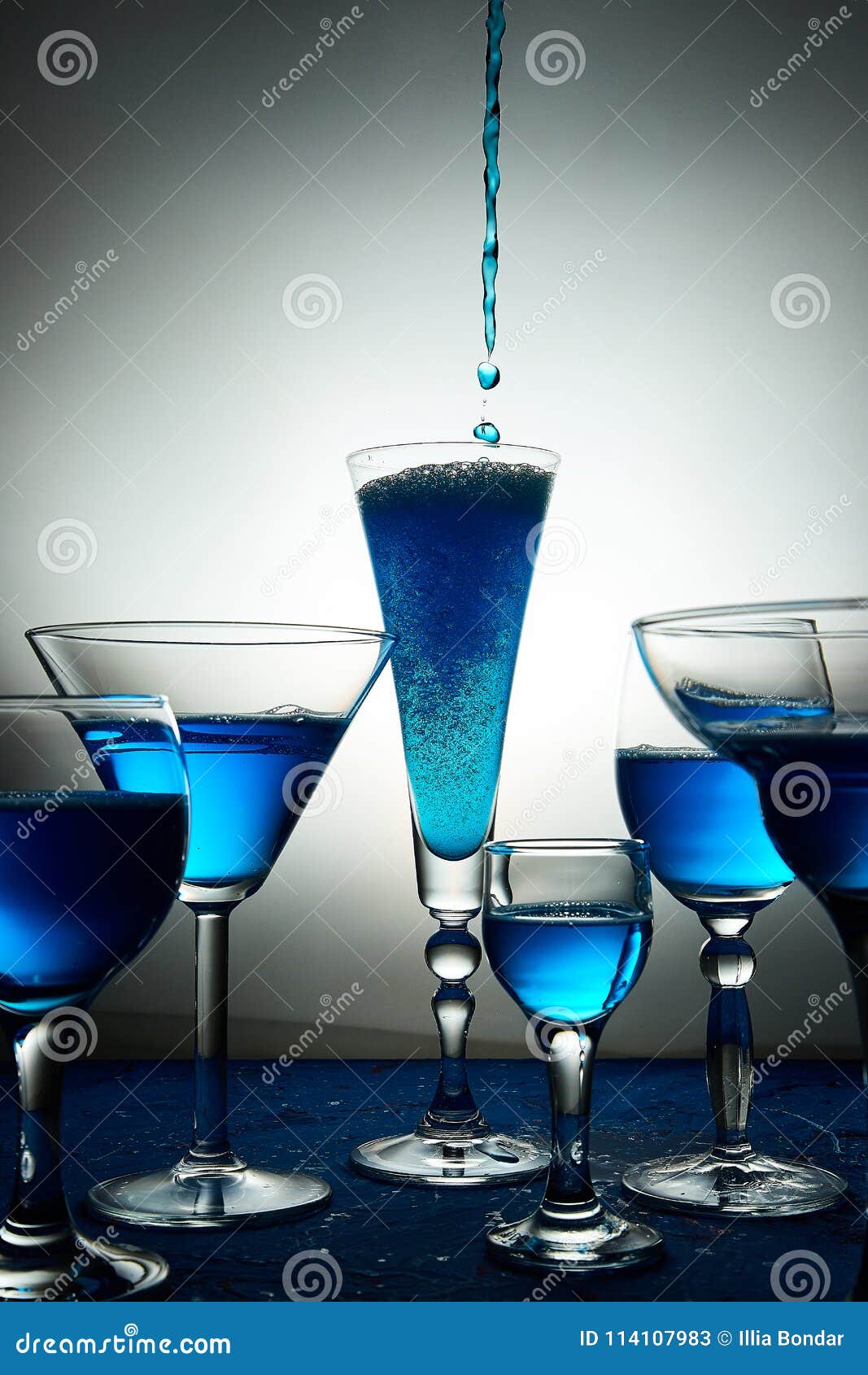 Many Glasses With Blue Champagne Or Cocktail. Stock Image - Image of ...