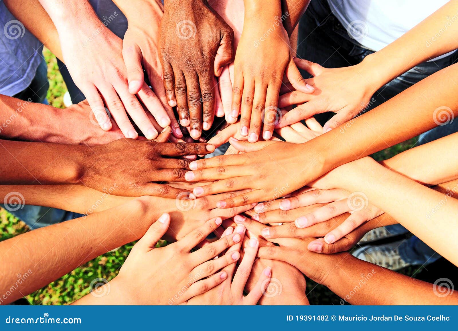 many hands together: group of people joining hands