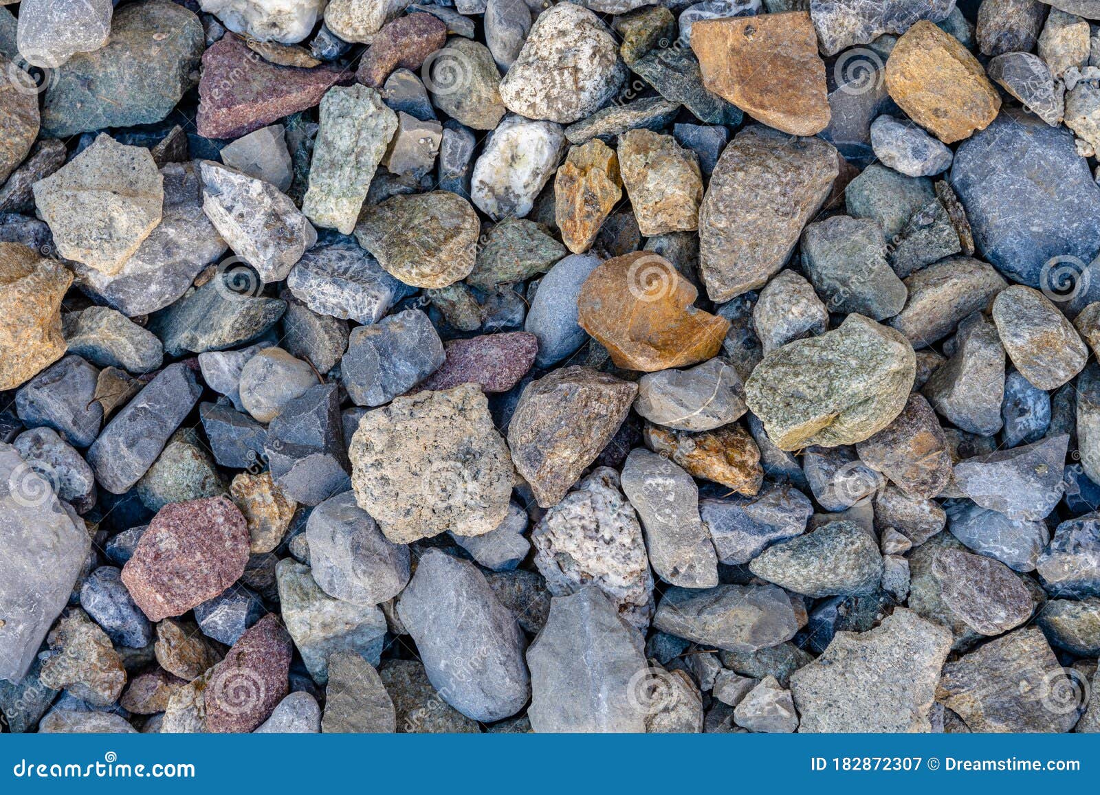 different colored and sized stones with a lot of detail and texture. background