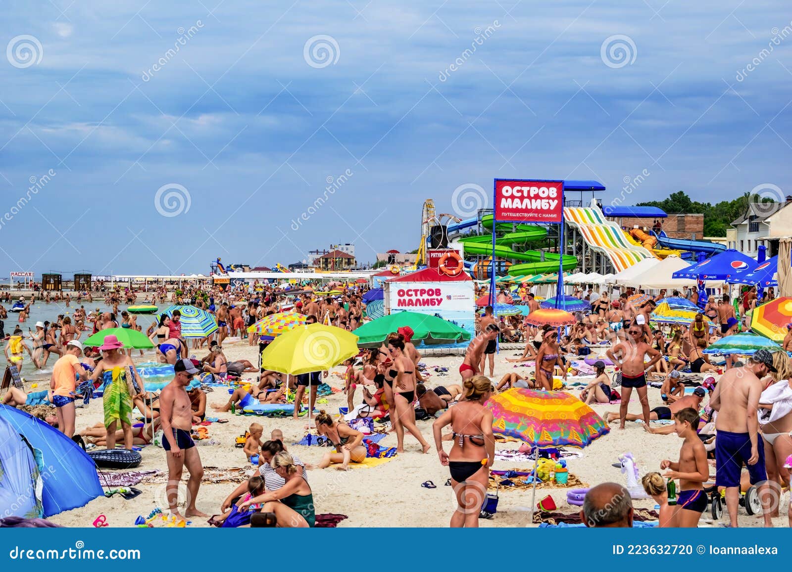 Many People on the Beach at Zaliznyi Port. a Crowd of Naked People in  Swimsuits Sunbathes Editorial Image - Image of holiday, relax: 223632720