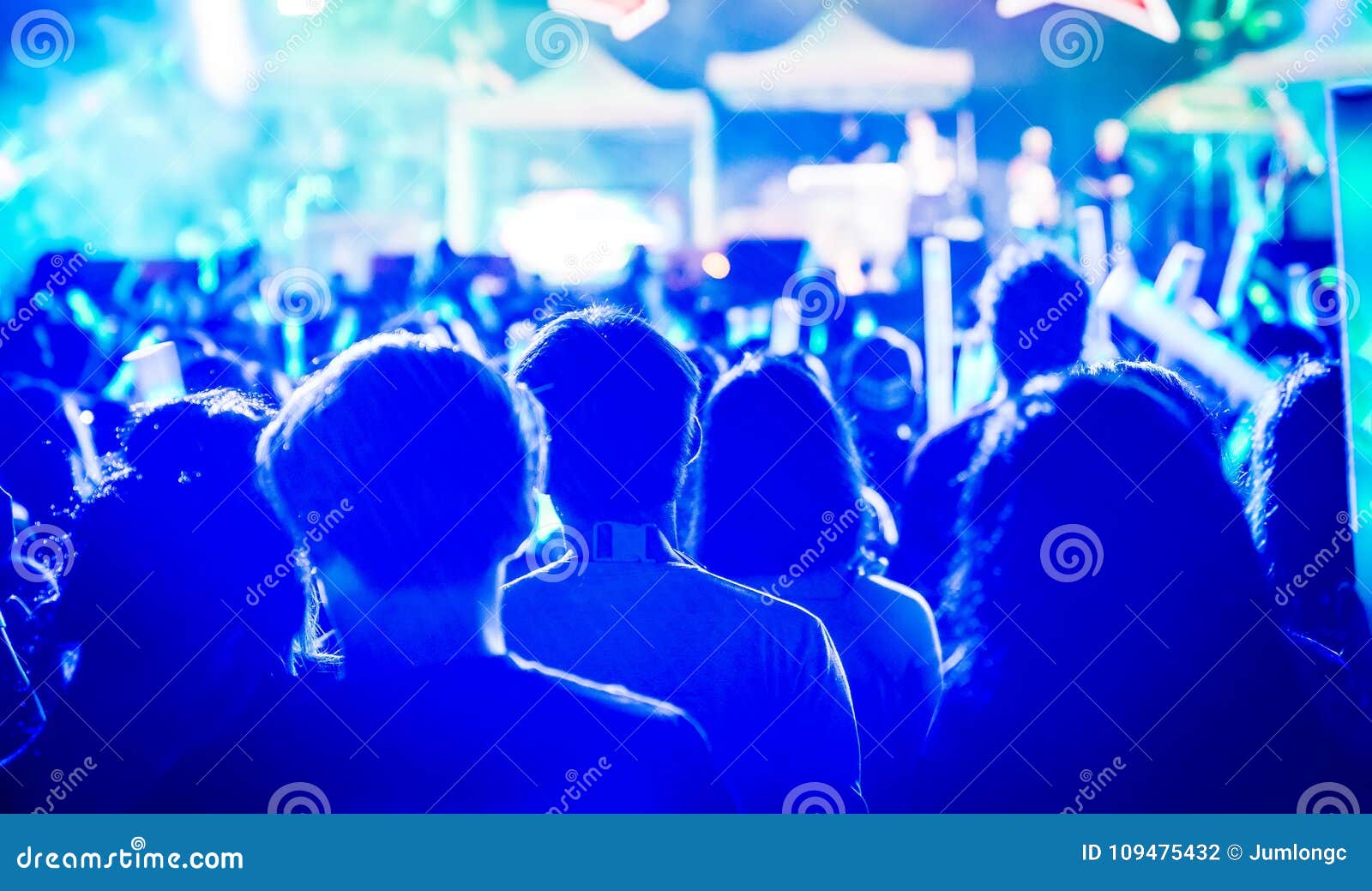 Many People are in Local Concert and All they Standing in Front of the ...