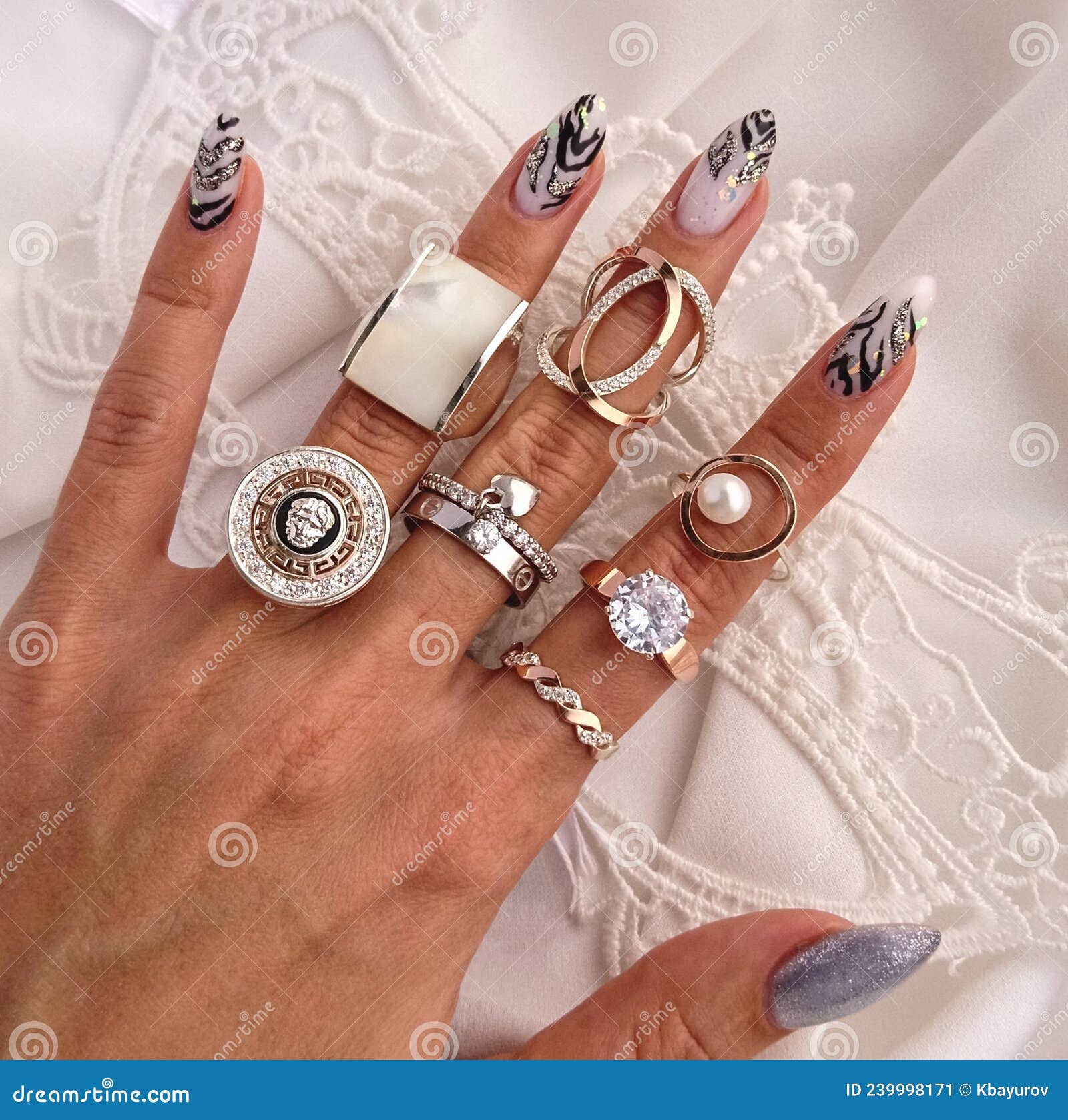 A Woman Wearing a Beautiful Finger Ring Jewelry. Stock Photo - Image of  female, closeup: 208800212