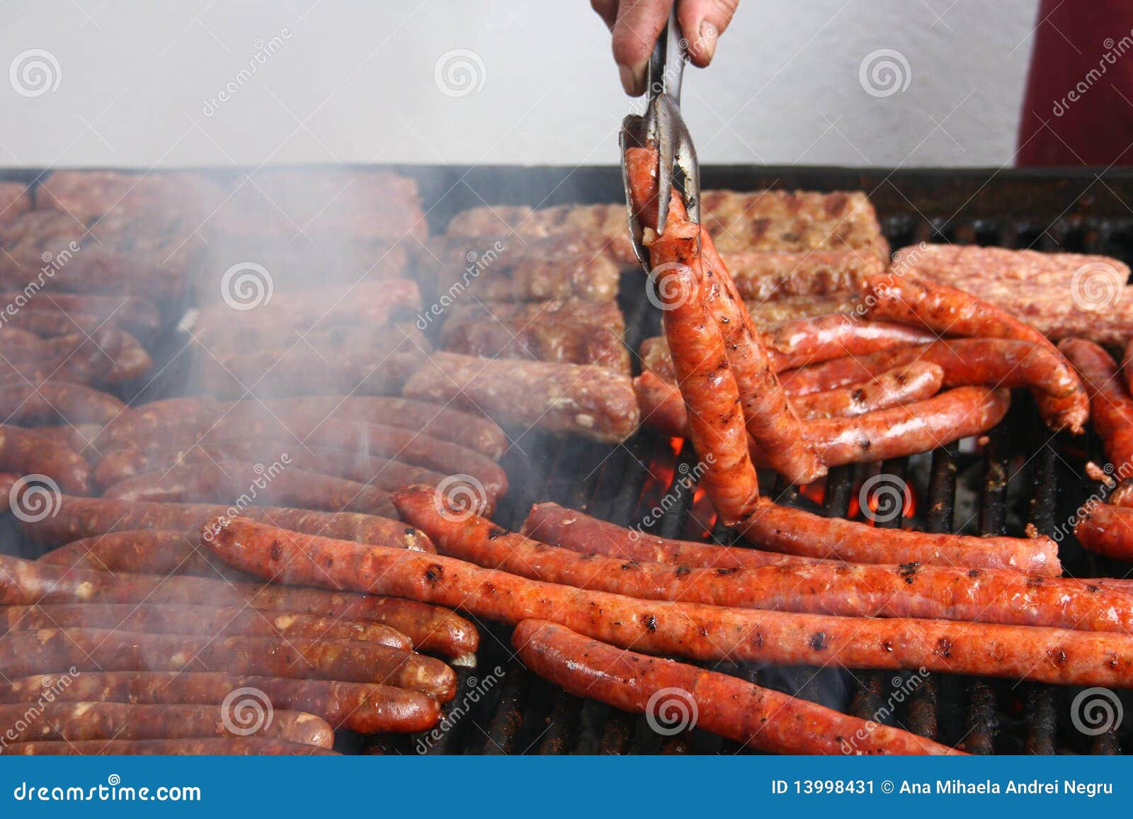 Many sausages on grill stock image. Image of closeup 13998431