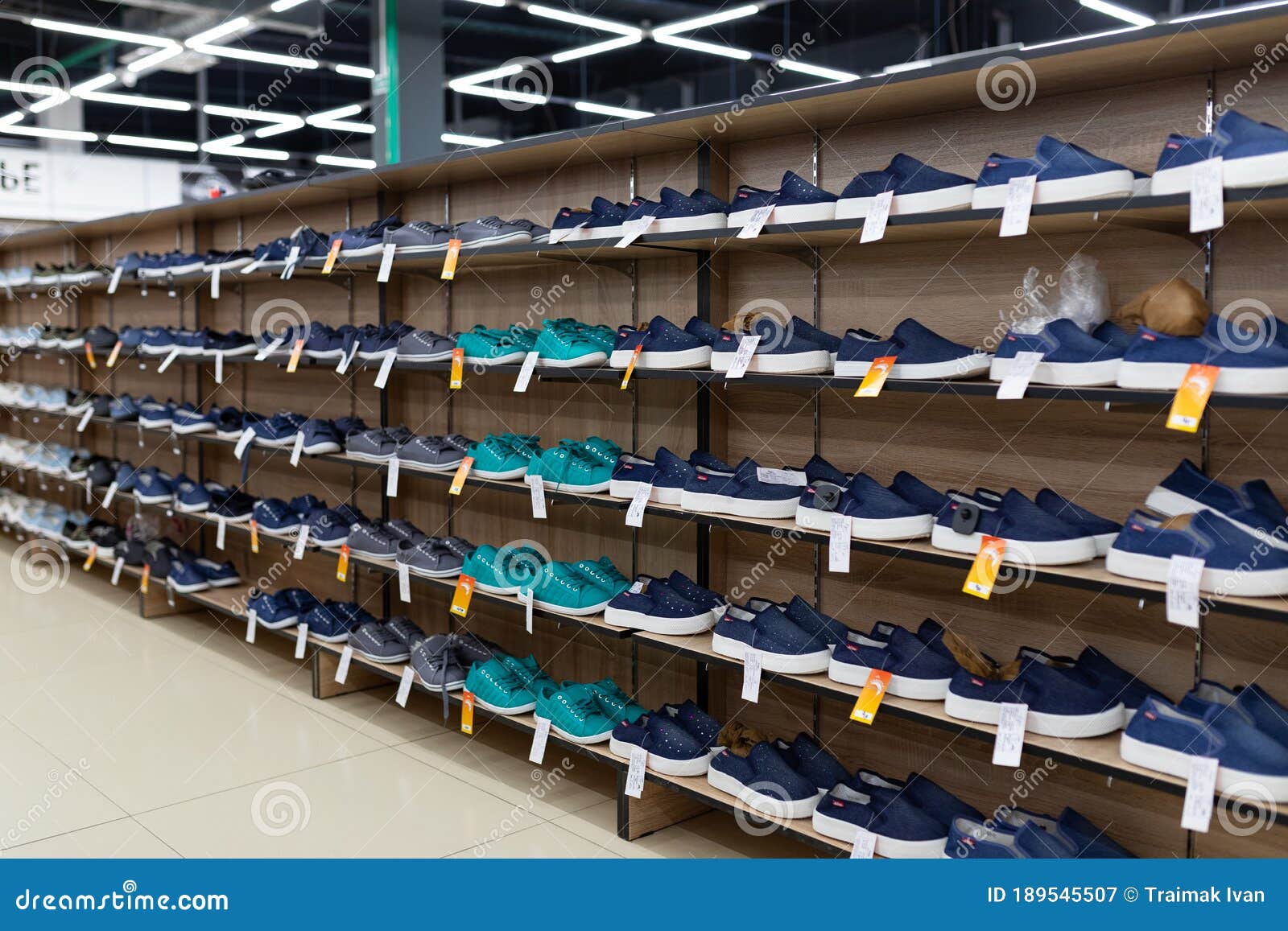 Many Shoes on the Shelves are in the Shoe Store Editorial Photography ...