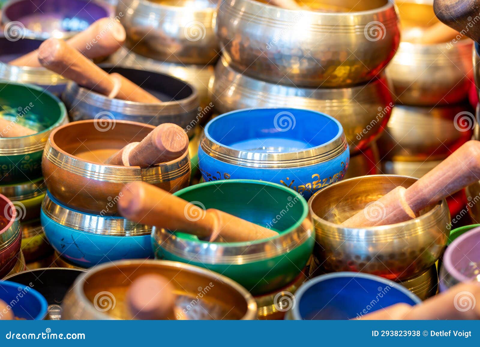 colorful singing bowls with gold rim