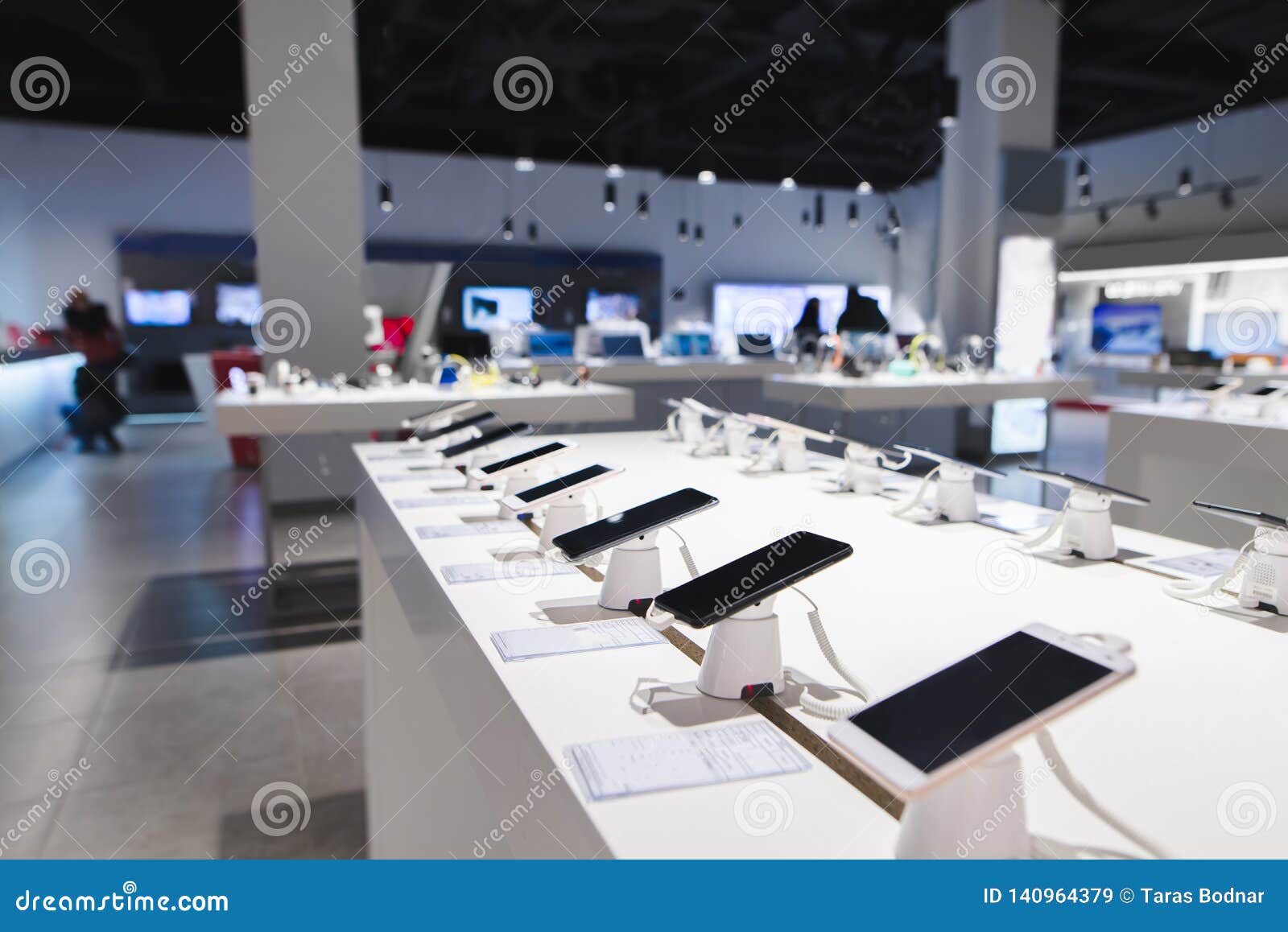 smartphones are on the table in the technology store. buying a mobile phone at the electronics store