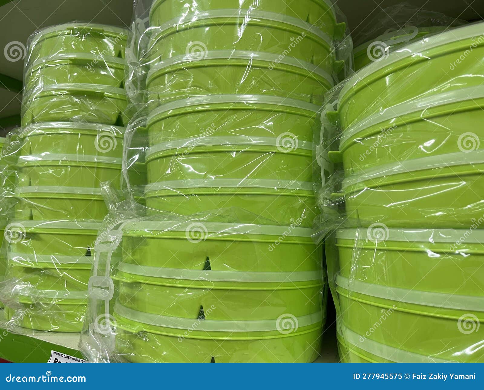 Stacks of Plastic Food Container with Lid in a Department Store. Stock