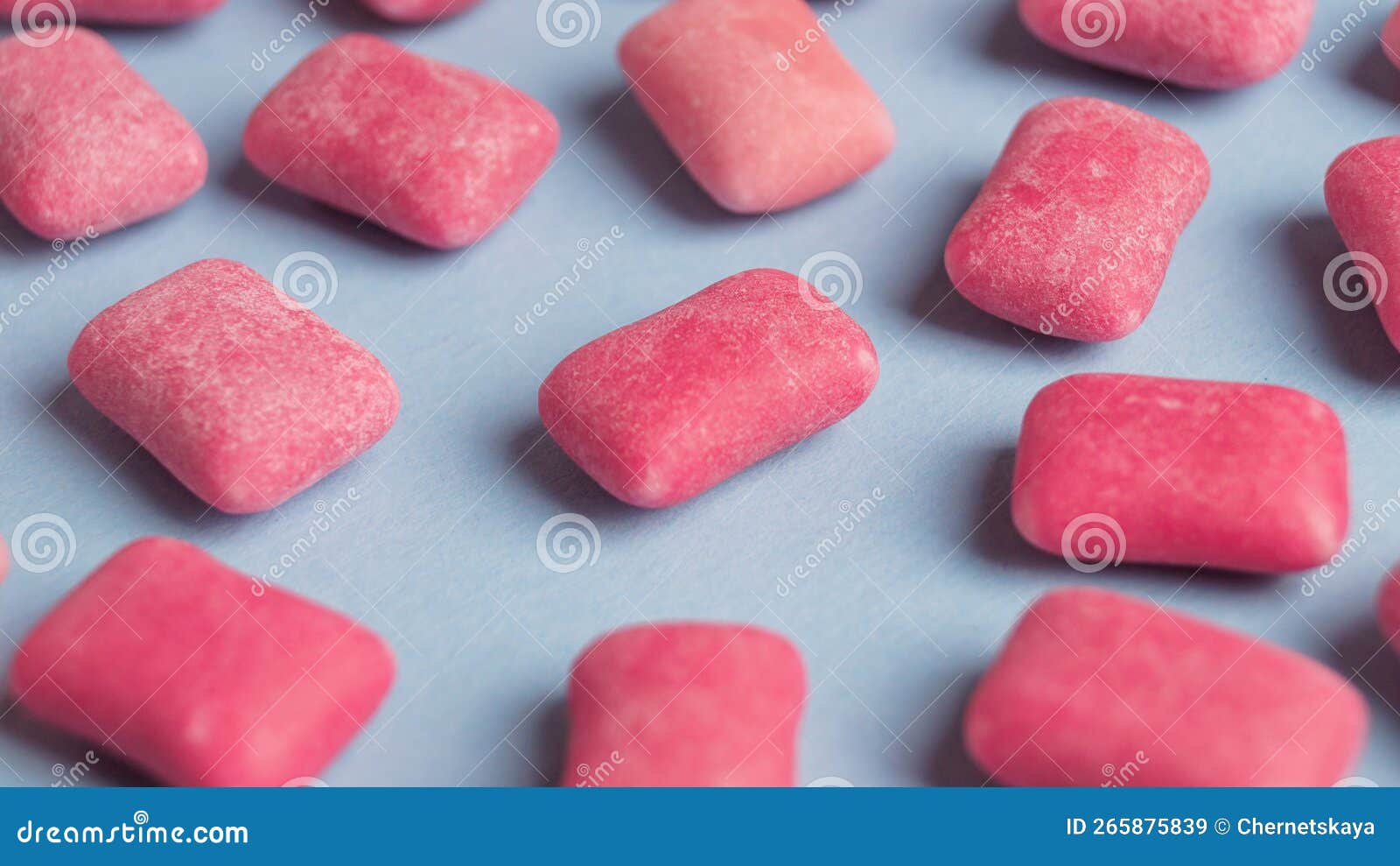 Many Sweet Chewing Gums on Light Blue Background, Closeup Stock Image