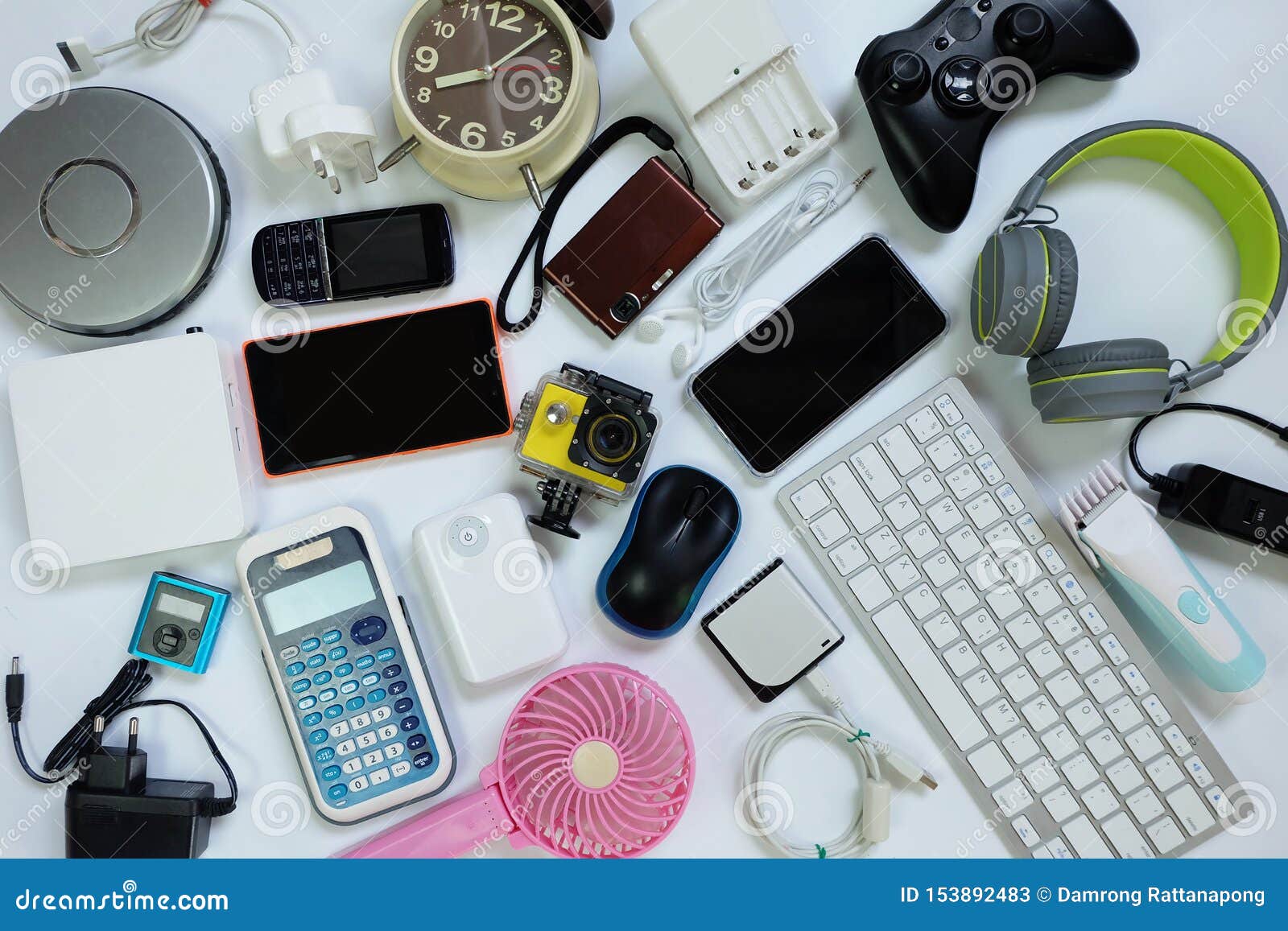 many used modern electronic gadgets for daily use on white floor, reuse and recycle concept