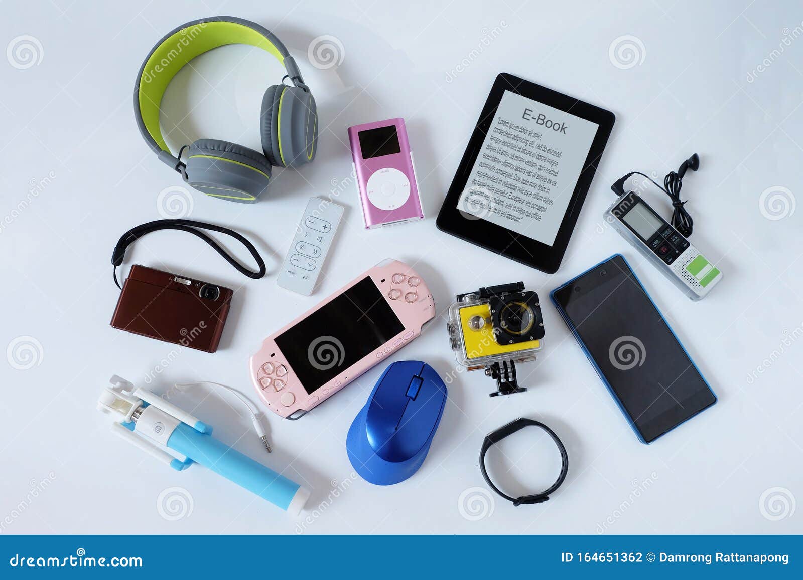 many used modern electronic gadgets for daily use on white floor, reuse and recycle concept