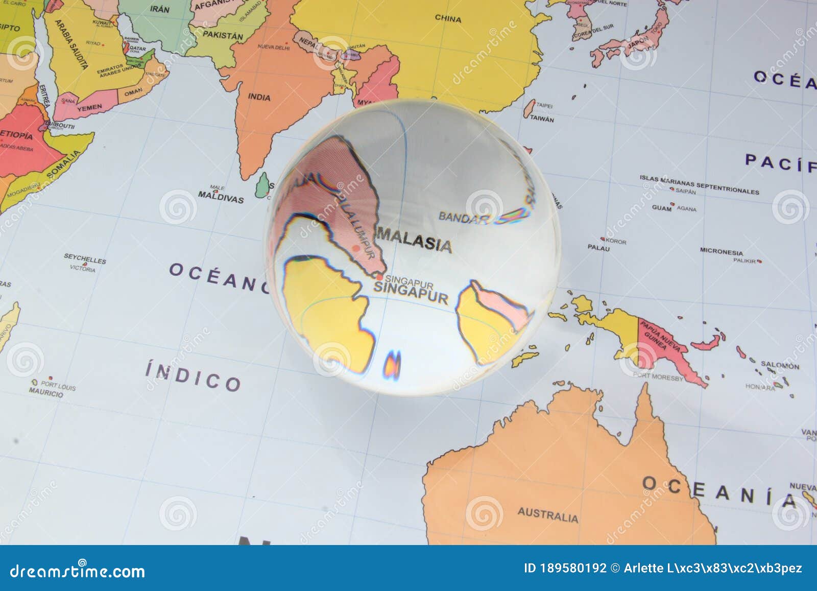 map view with crystal ball pointing malasia singapur