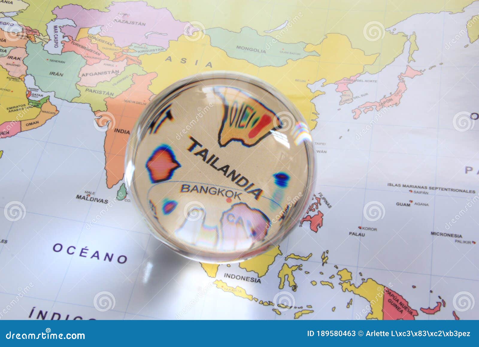 map view with crystal ball pointing tailandia