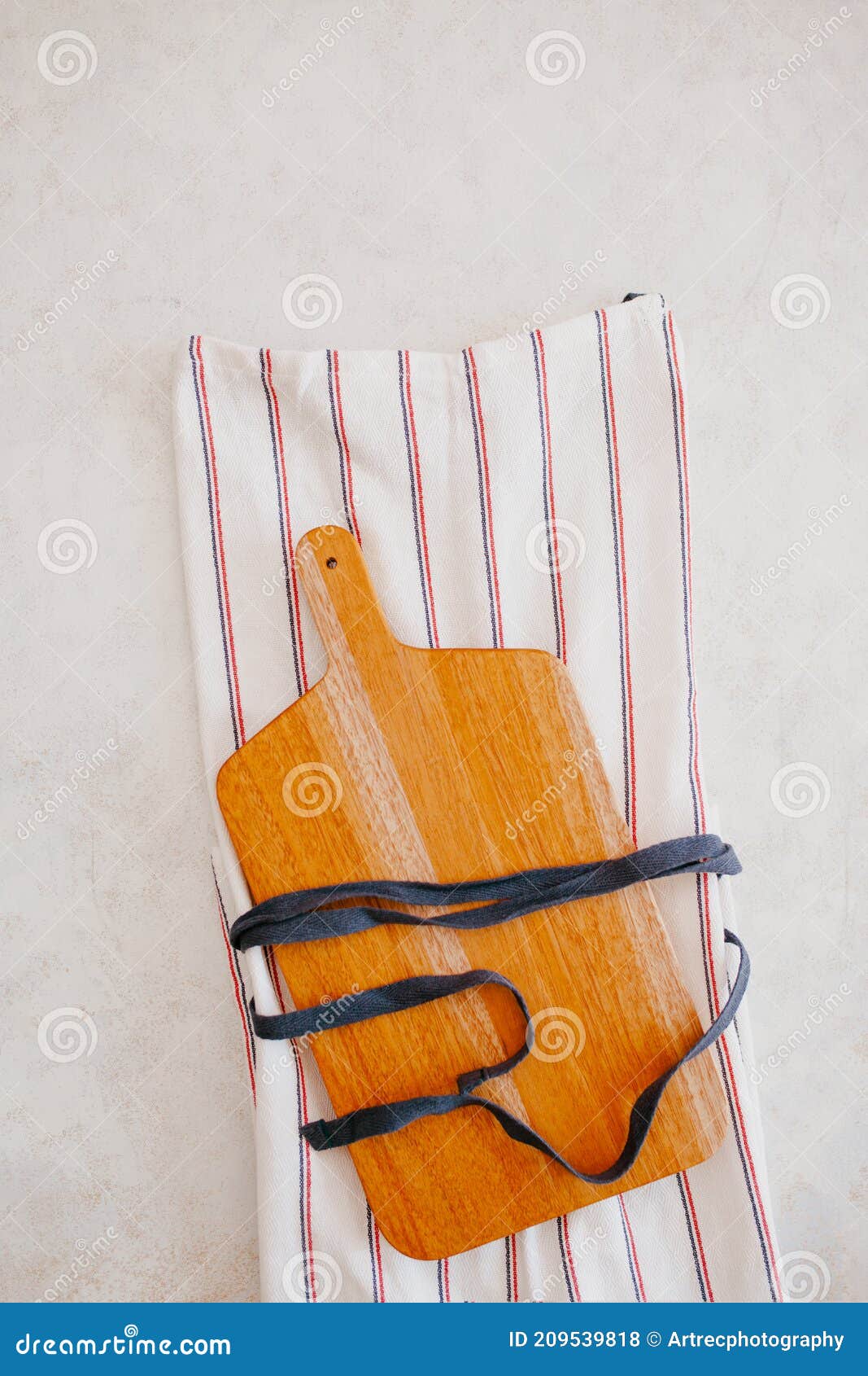 Maple Kitchen Cutting Board on White Background with Kitchen Apron