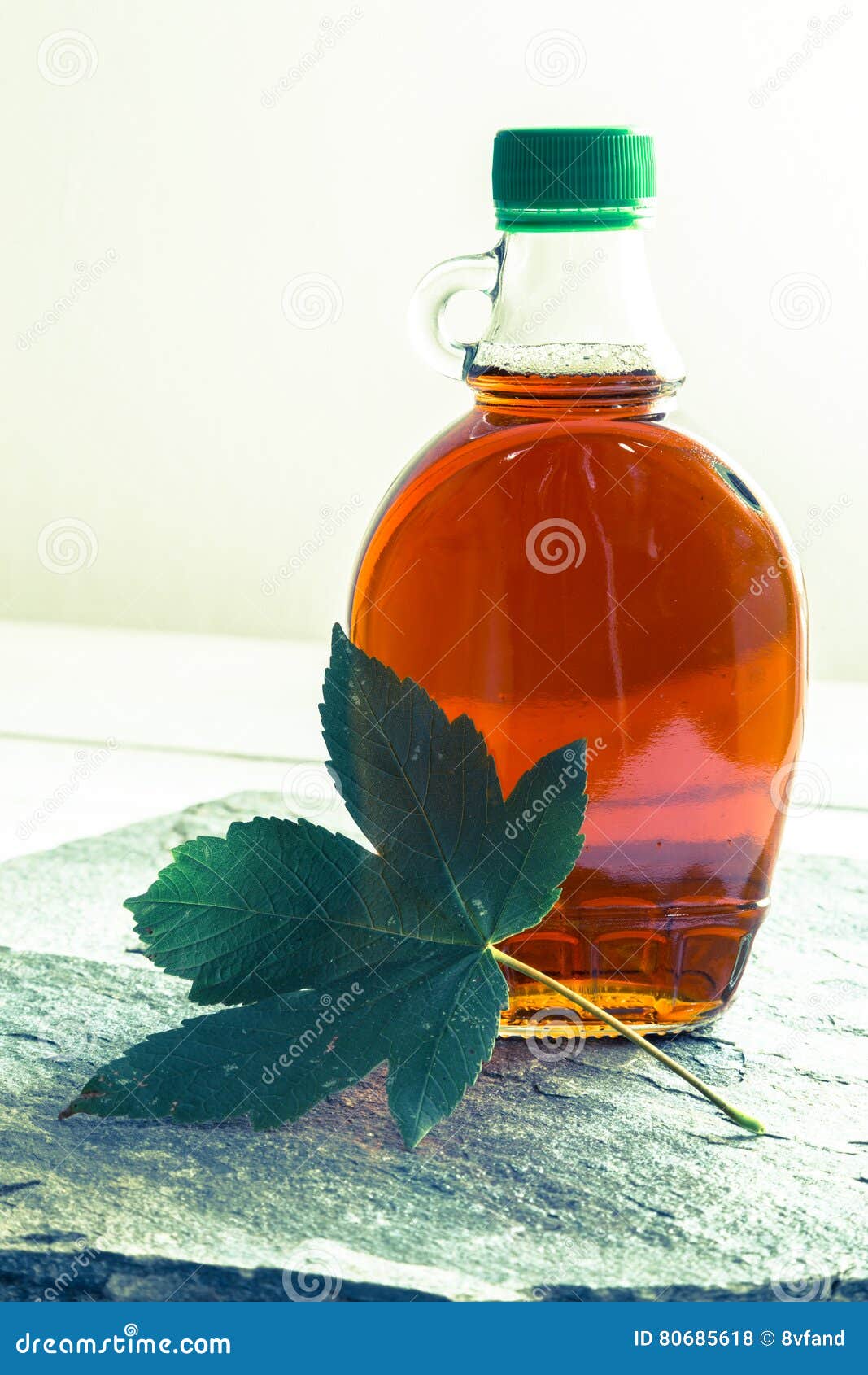 Maple Syrup in a Bottle with Maple Leaf Stock Photo Image of xylem, retro 80685618