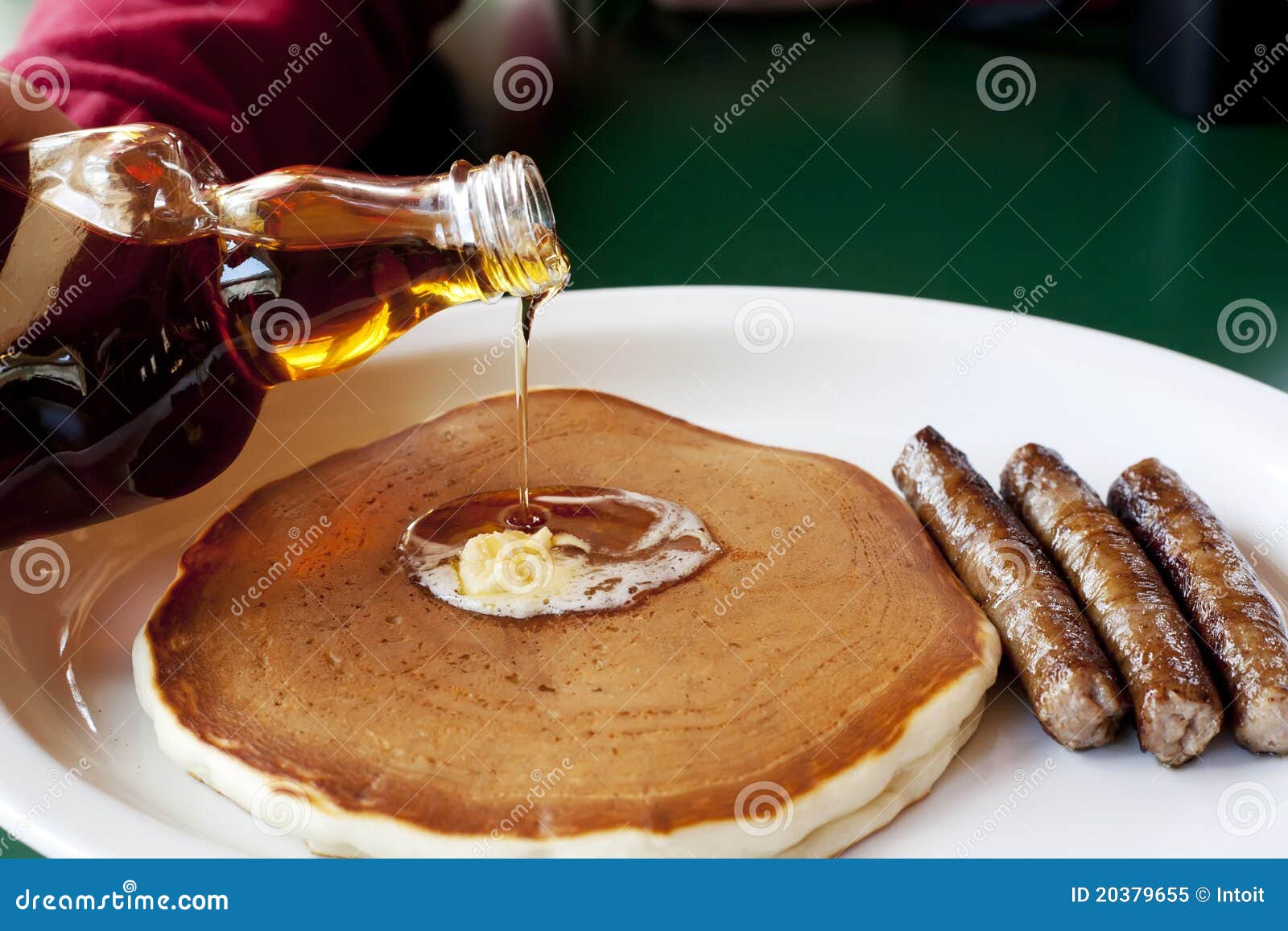 maple syrup on pancakes with sausage