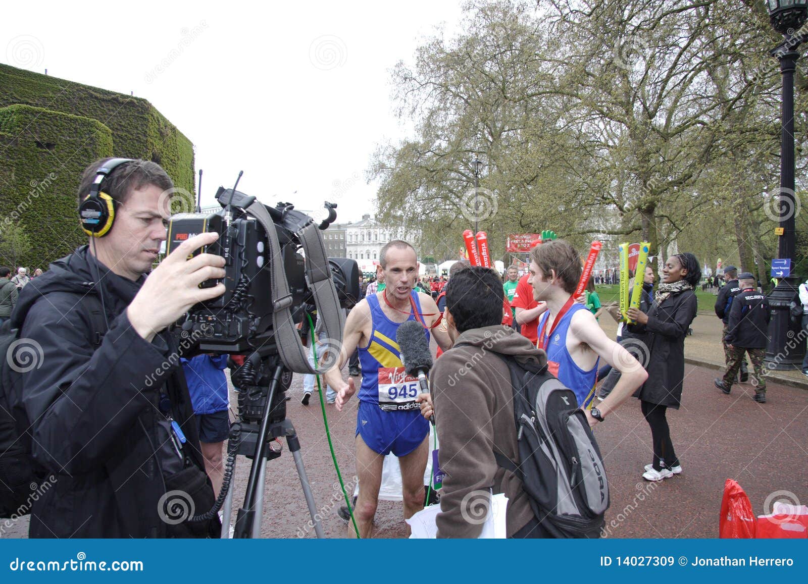 Marathon Runner Having a Television Interview Editorial Stock Image