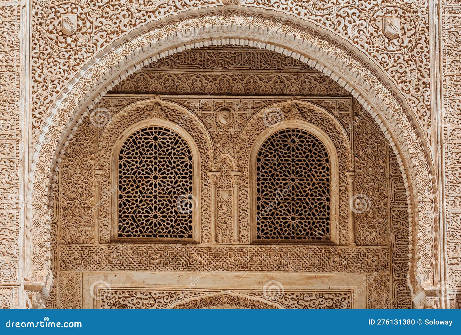 marble capitals and stucco decoration of the portico in patio del cuarto dorado in mexuar in comares palace alhambra, andalusia,