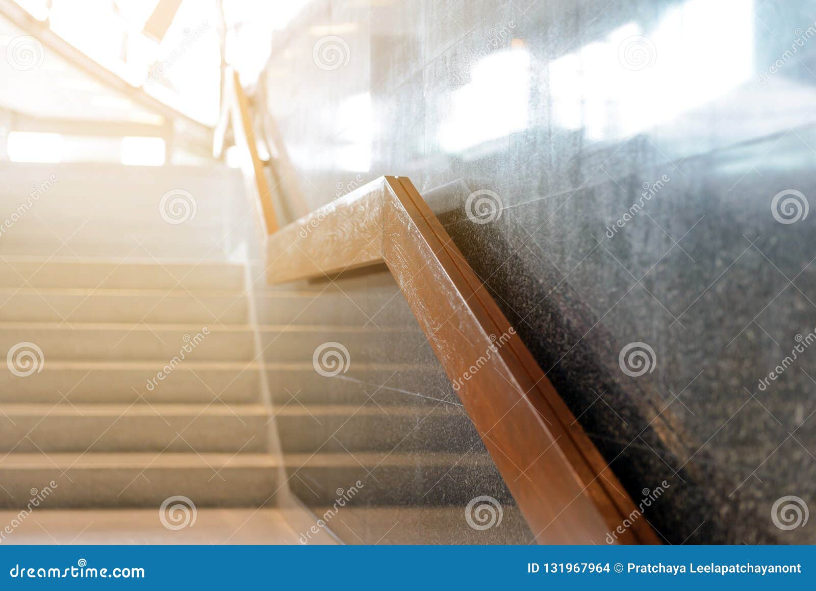Marble Stairs With Wooden Handrail In Building For Step Up