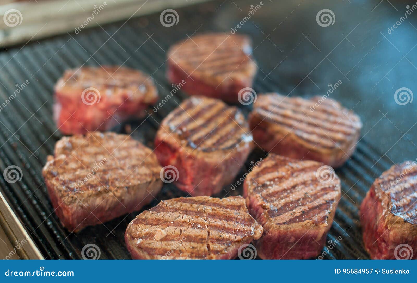 Marbled Veal Steaks are Toasted on a Ribbed Plate. Grill Stock Image