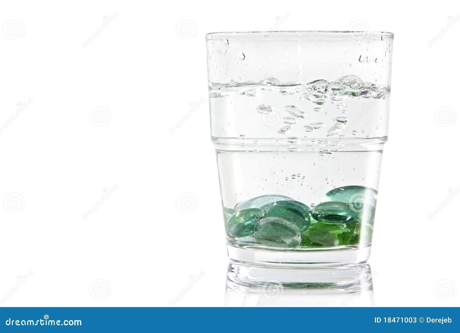 Marbles in a Glass of Water Stock Image Image of background, isolated