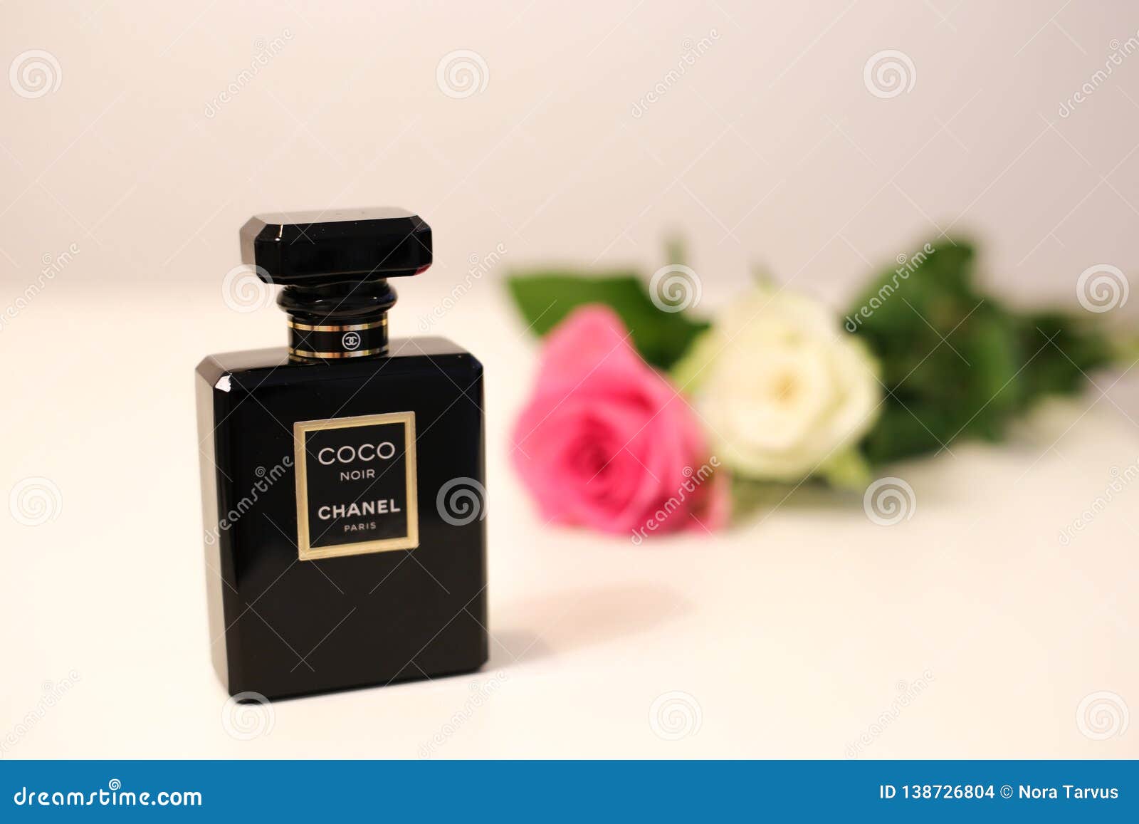Beautiful and Trendy Perfume Sprayer on a White Table with Two Roses  Editorial Stock Image - Image of elegance, flower: 138726804