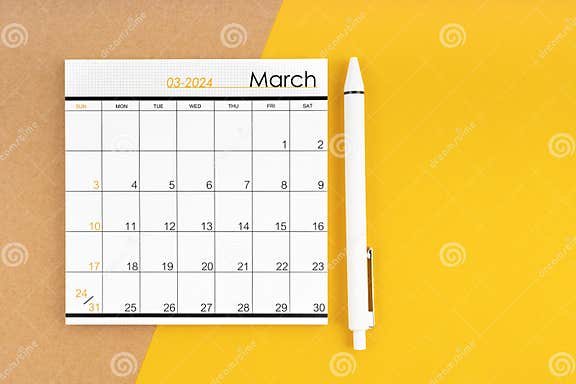 March 2024 Monthly Calendar for 2024 Year with Pen on Yellow Stock