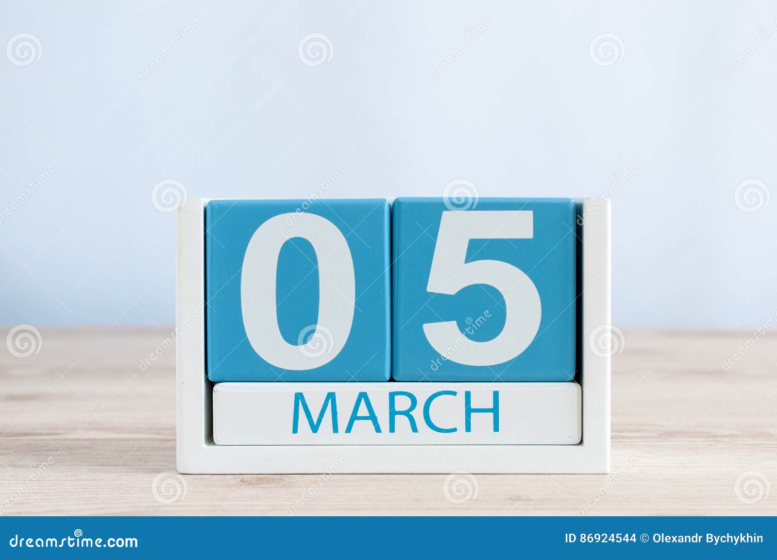 March 5th. Day 5 of Month, daily Calendar on Wooden Table Background