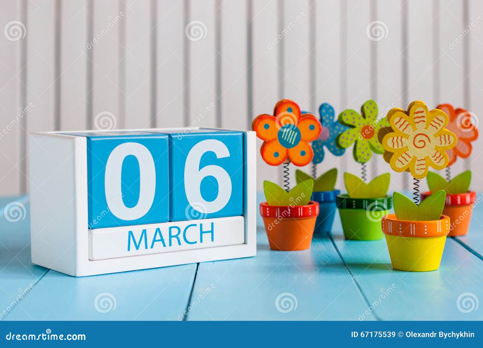 March 6th. Image of March 6 Wooden Color Calendar with Flower on White