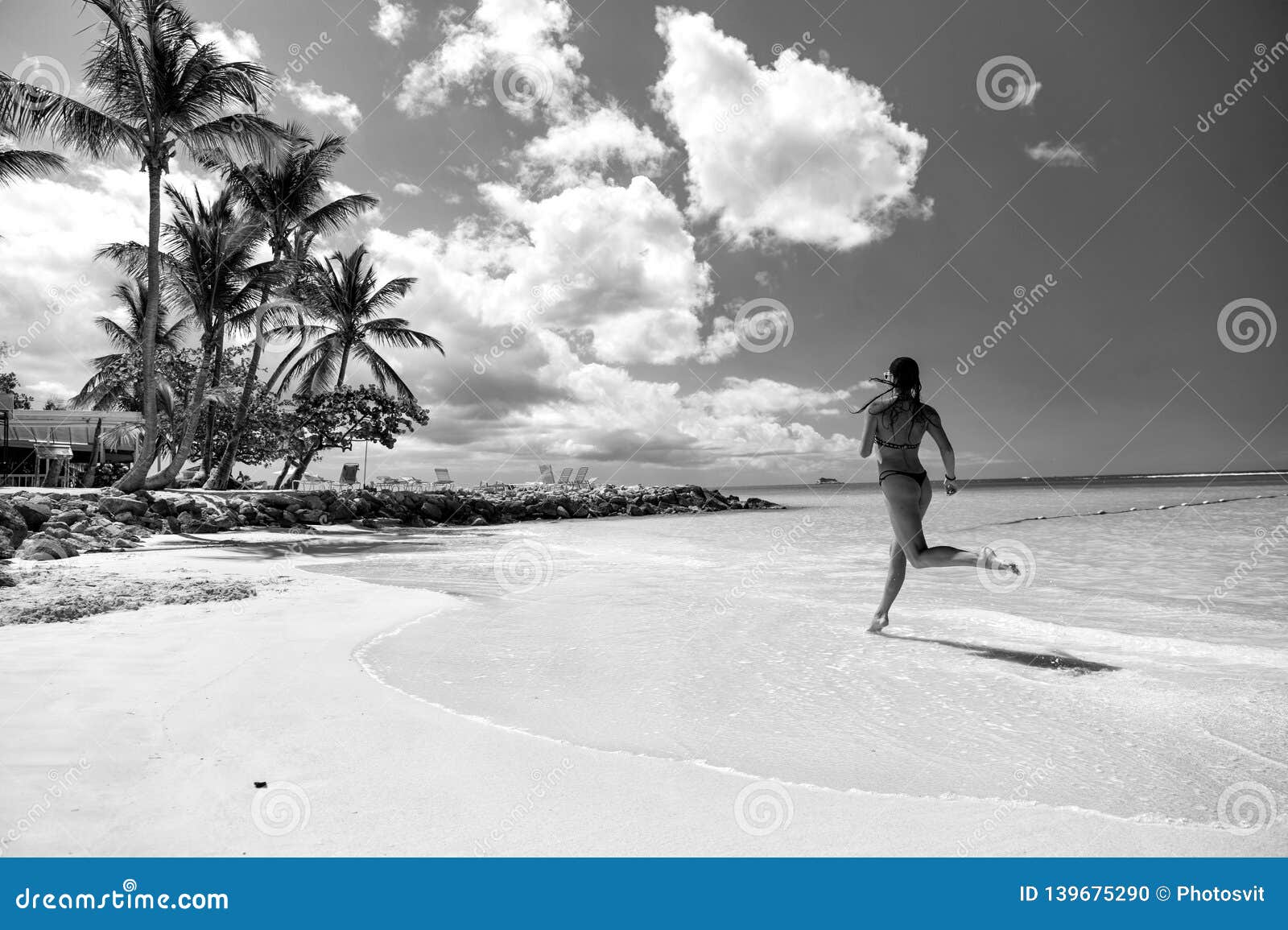 Young woman in water stock photo. Image of sport, palm - 139675290