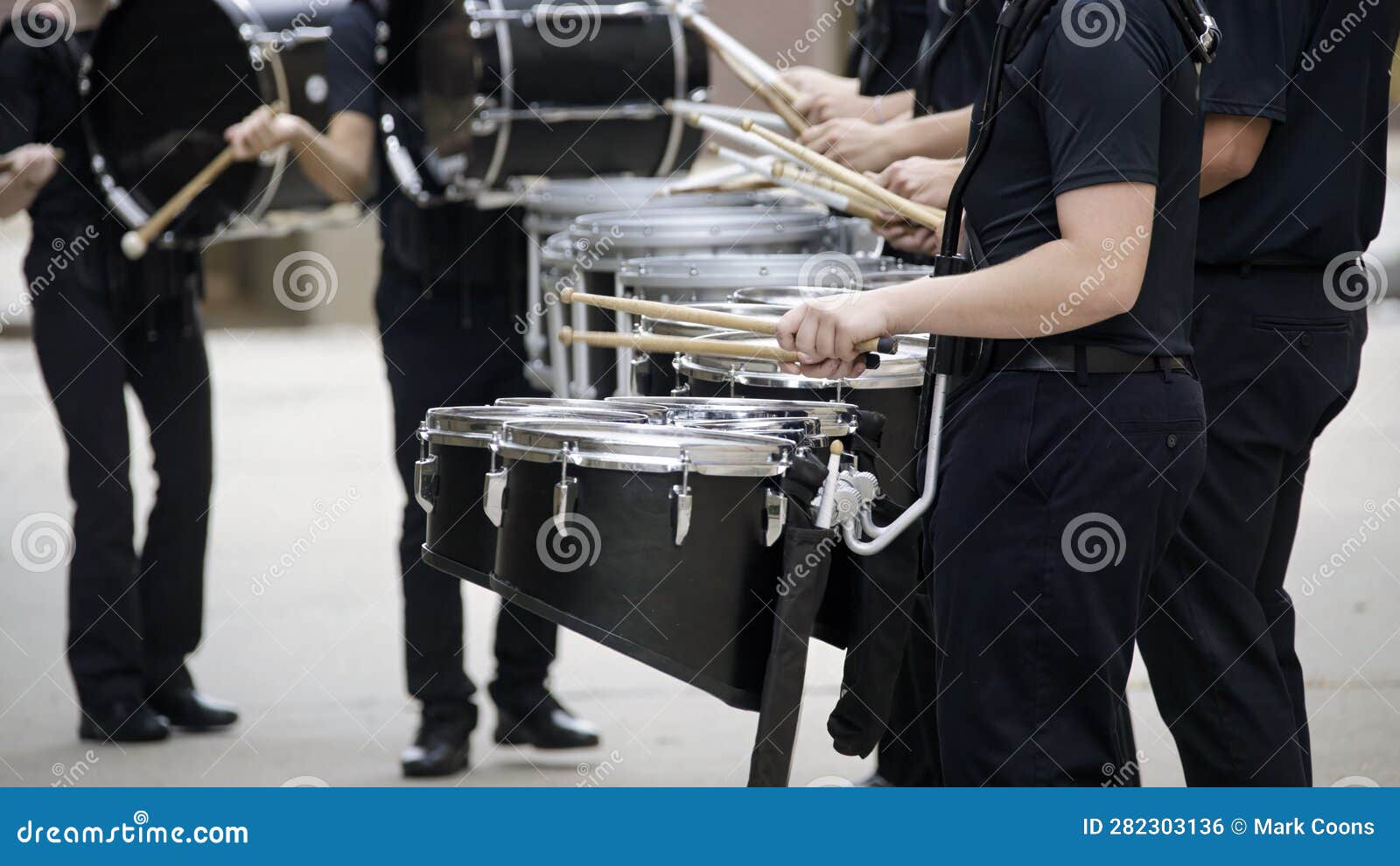 A Marching Band Drum Line Warming Up for a Parade Stock Photo Image