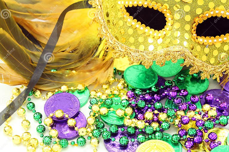 mardi gras beads and doubloons