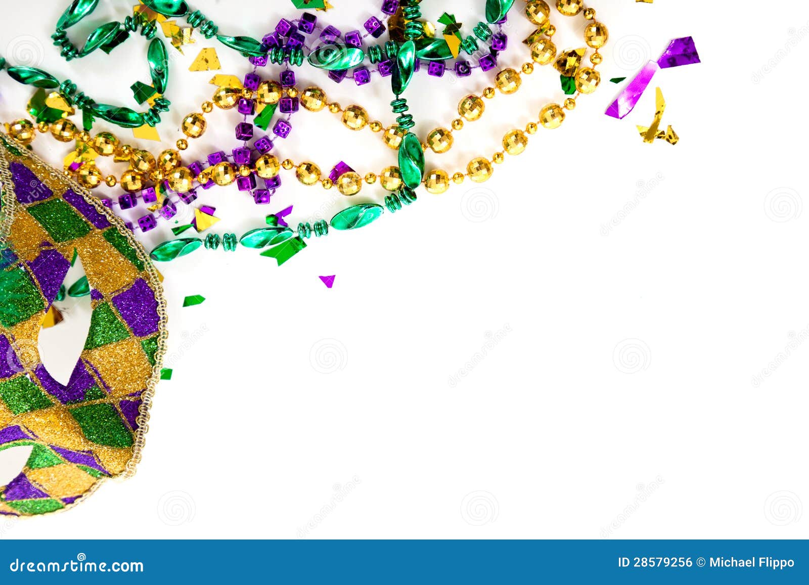 a mardi gras mask and beads on a white background with copy space