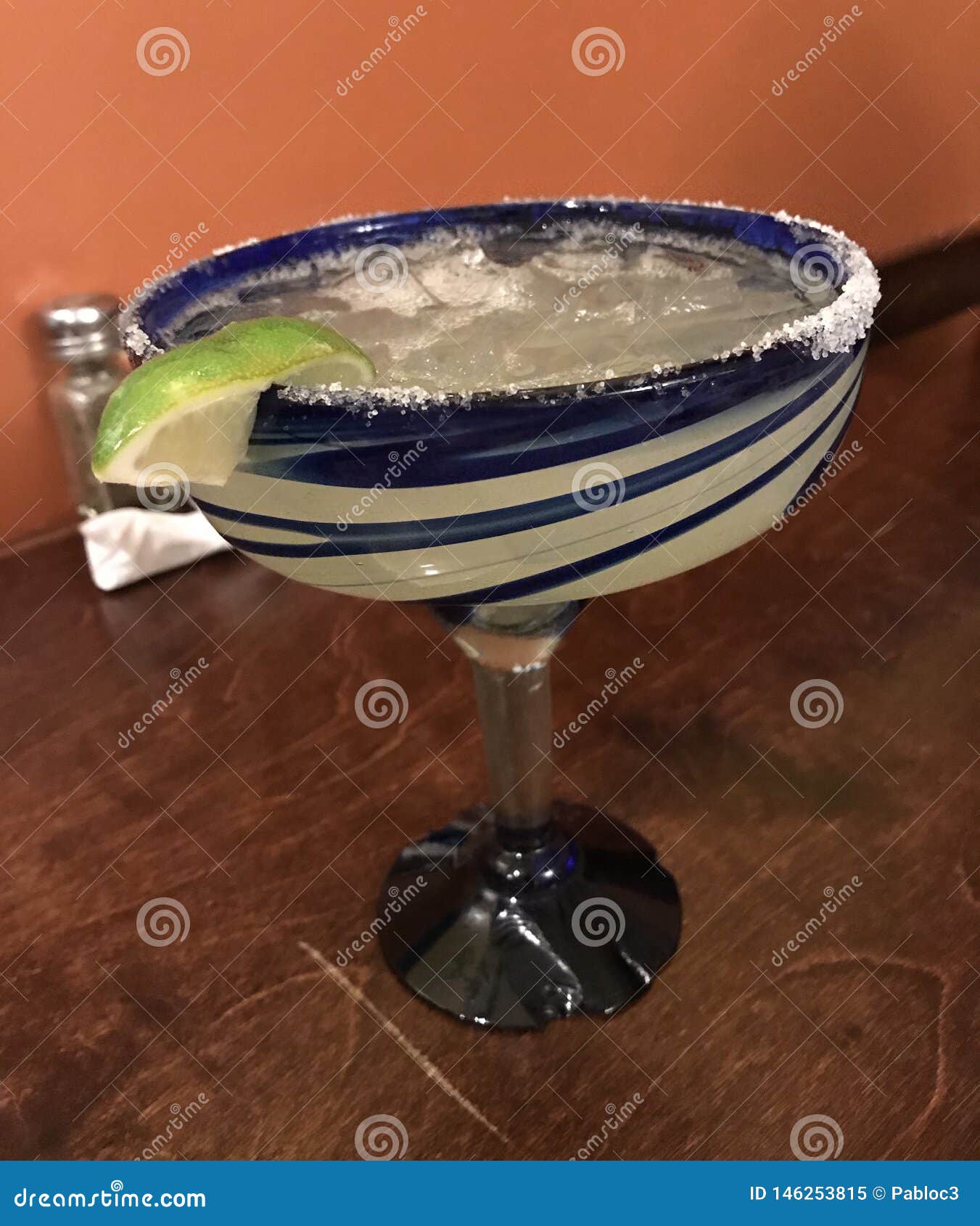 Margarita on the Rocks in a Blue Glass Stock Image Image of frozen