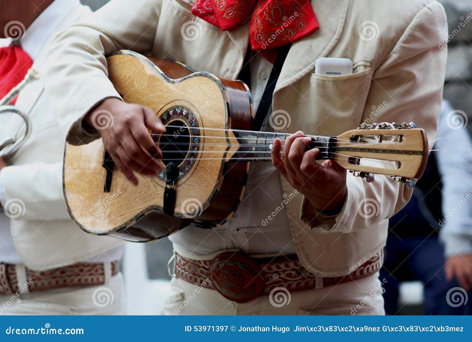 mariachi playing guitar