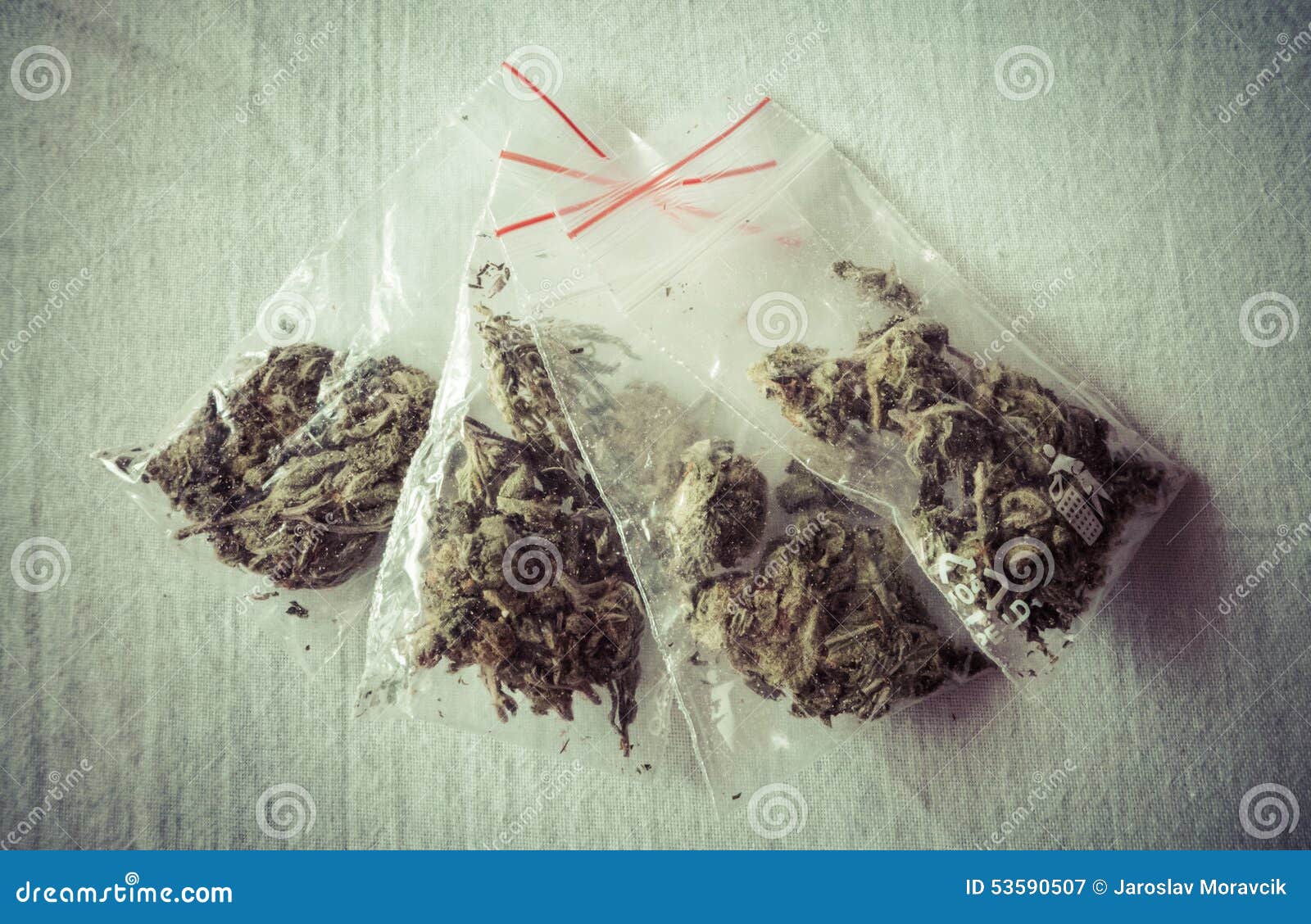 Marijuana in plastic bags stock image. Image of cannabis 53590507
