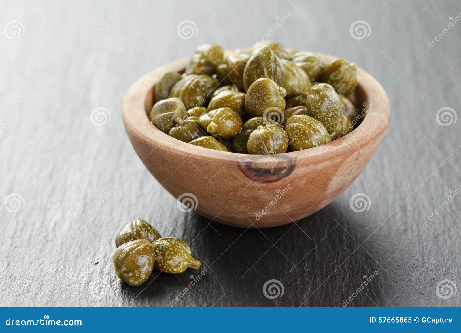 Marinated Capers in Olive Bowl on Slate Board Stock Image Image of