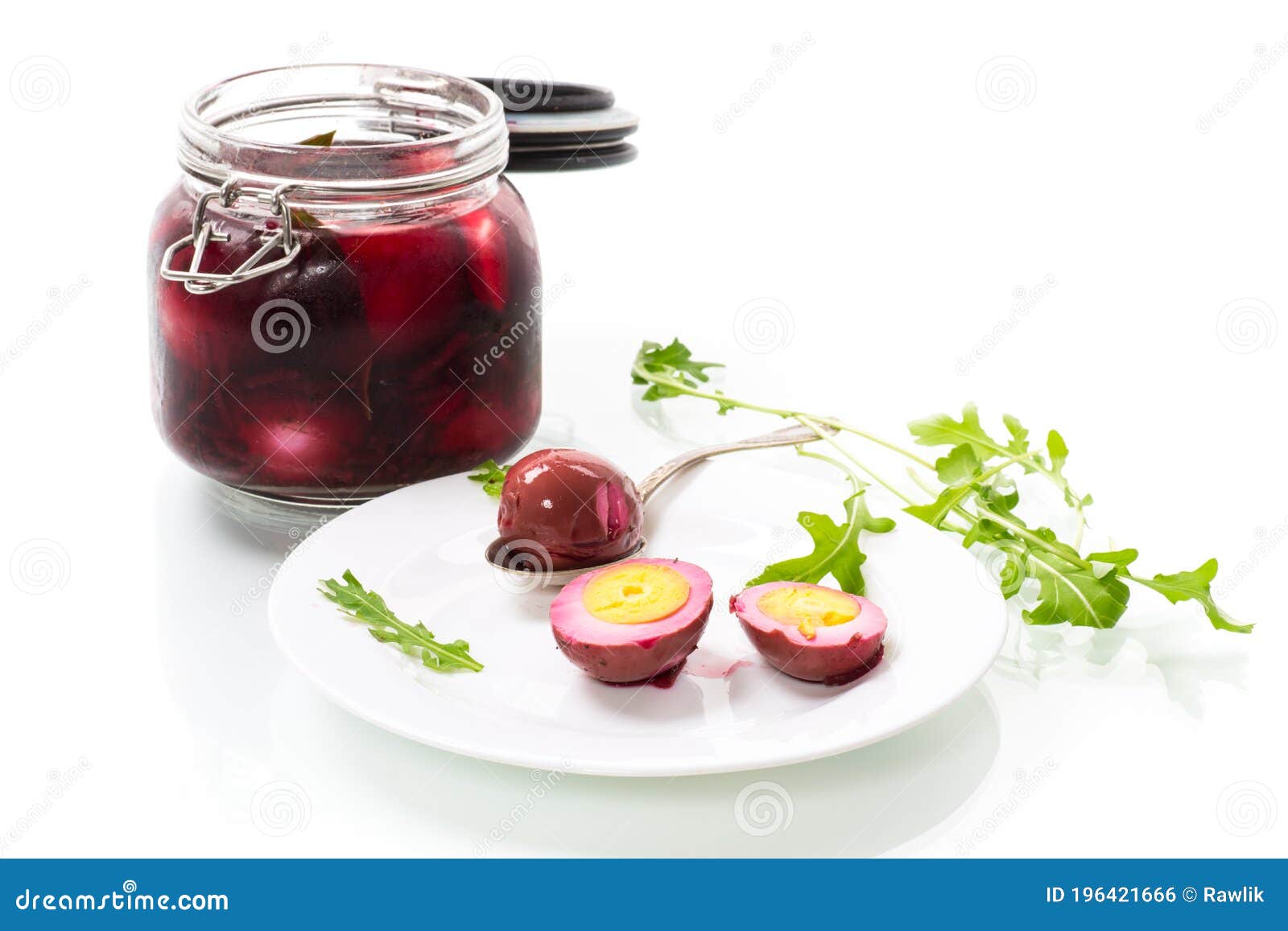 Marinated Chicken Eggs in Beetroot Marinade in a Plate Stock Photo
