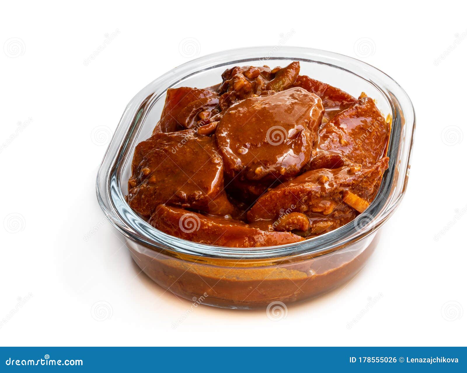 Marinated Chicken Slices in Glass Bowl Isolated on White. Ready for