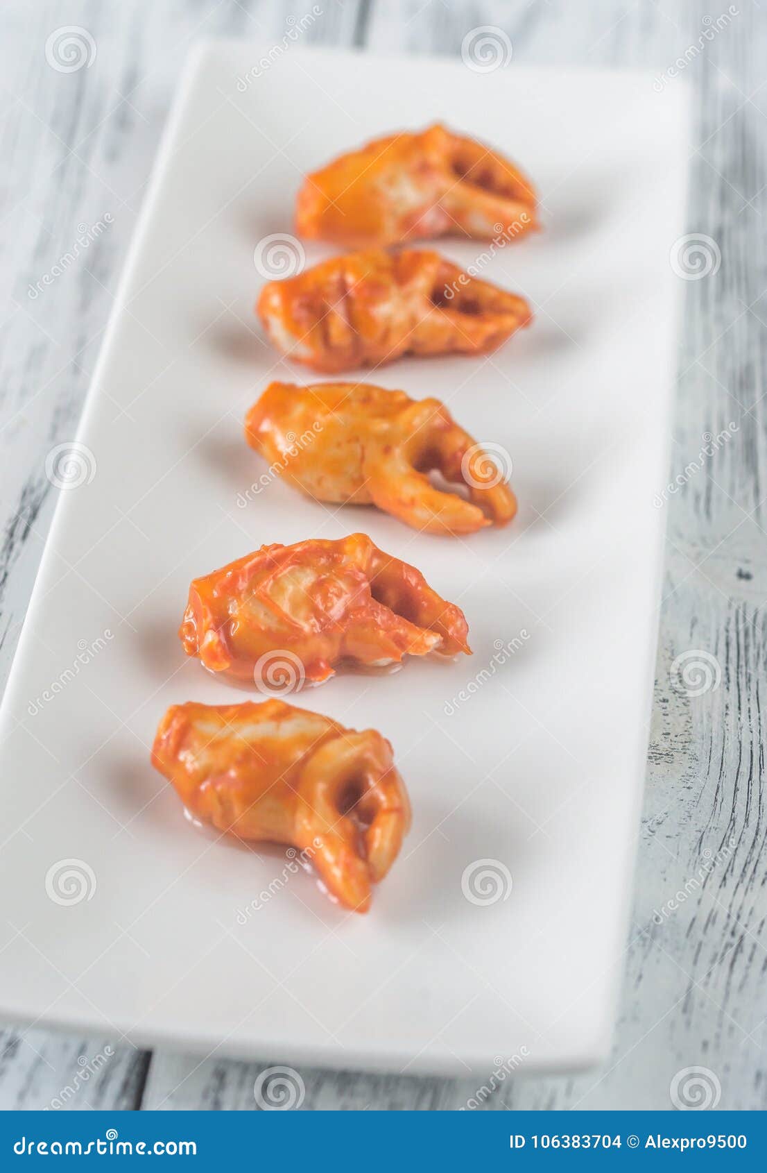 Marinated Crab Claws on the White Plate Stock Photo Image of cooked, group 106383704