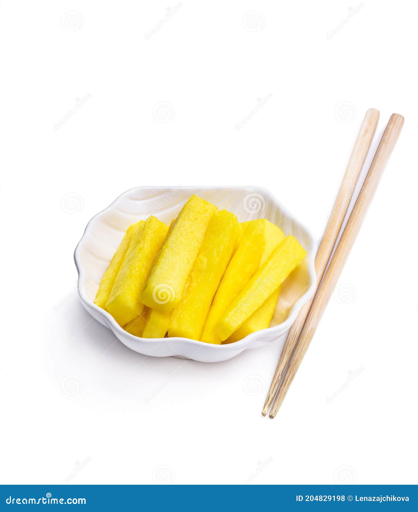 Marinated Daikon Slice with Chopsticks Isolated on White Stock Photo