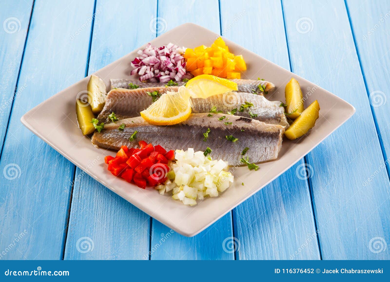 Marinated herring fillets stock photo. Image of meal 116376452