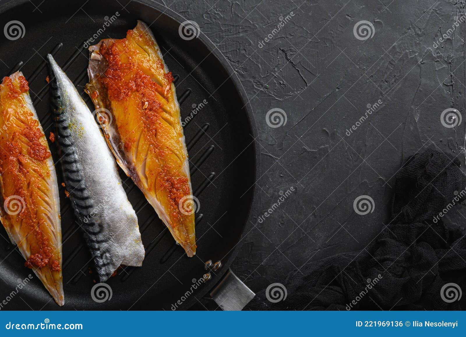 Marinated Mackerel on Grill Pan on Black Background, Top View with Copy