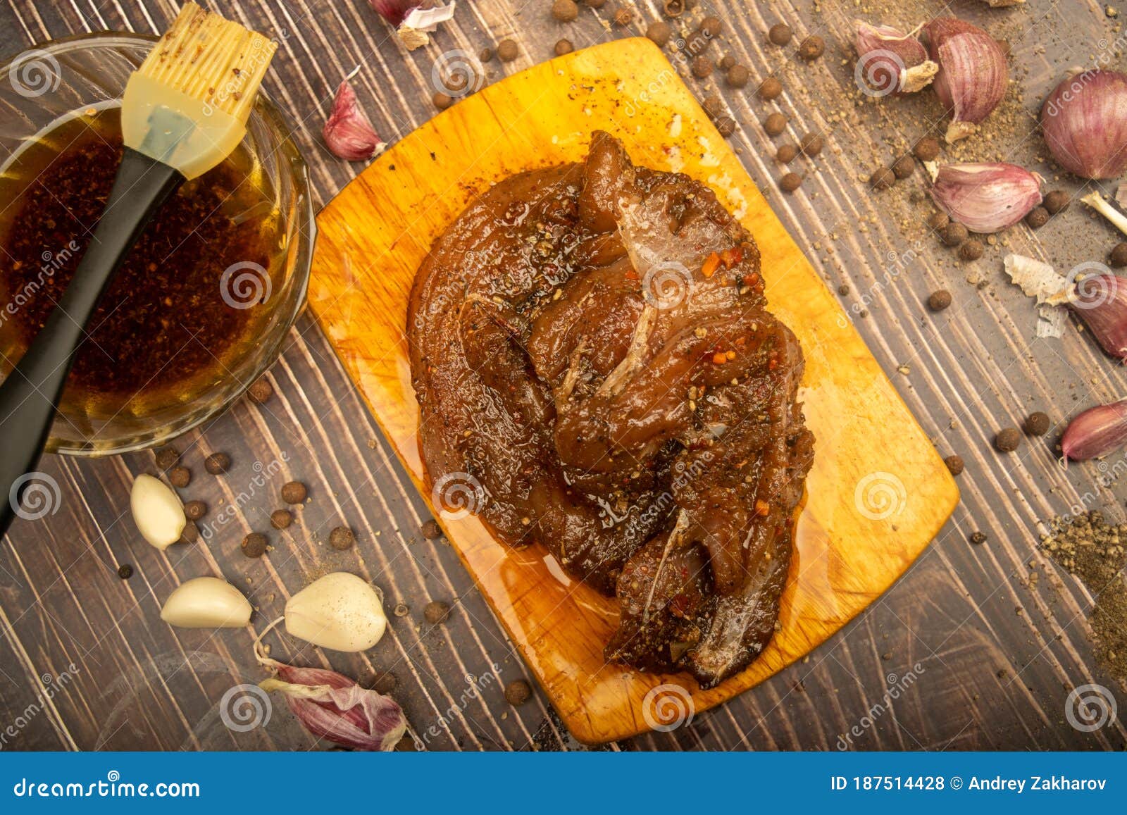 Marinated Meat on a Cutting Board, Garlic, Allspice, Spices. Close Up Stock Photo Image of
