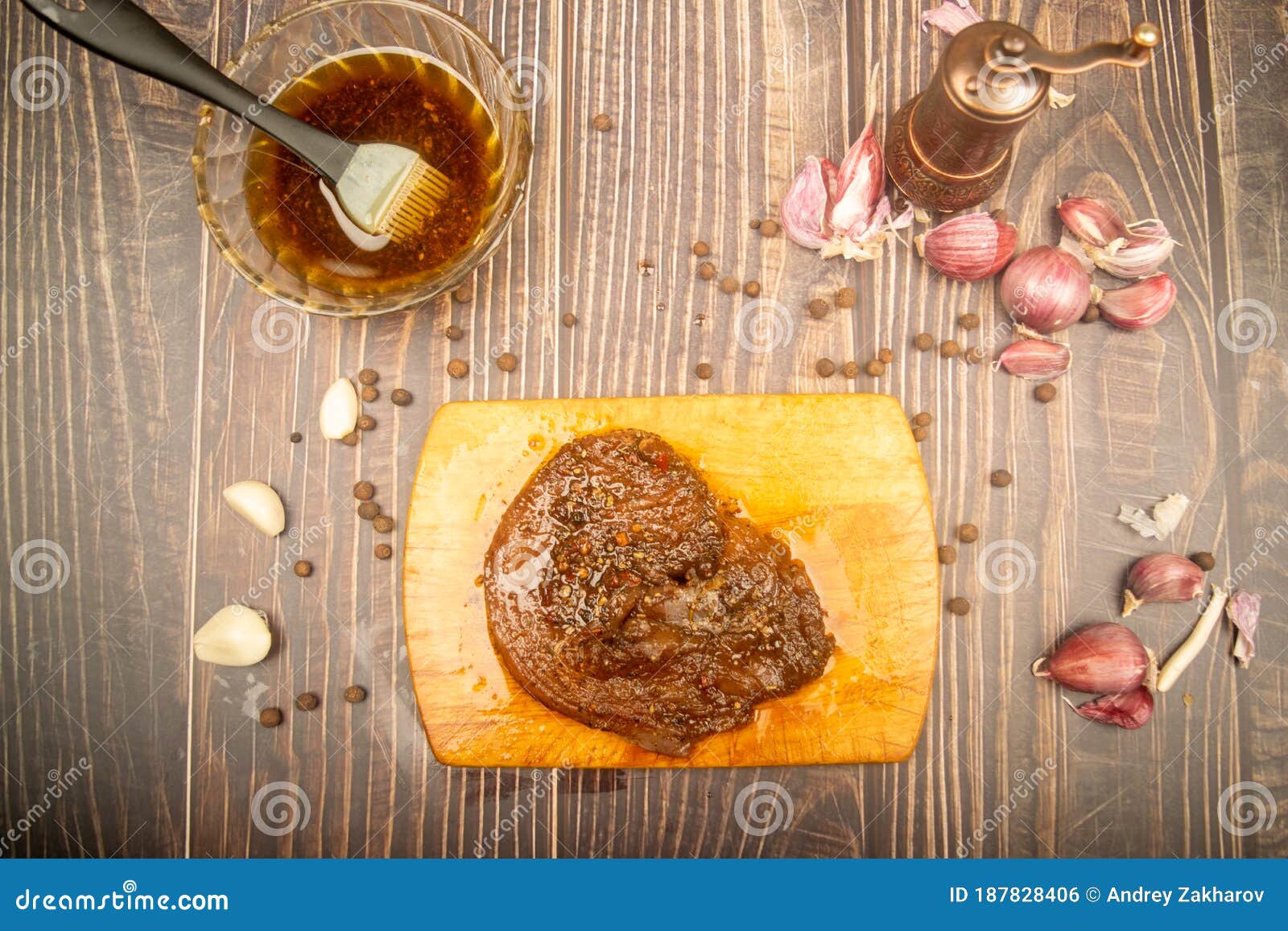 Marinated Meat on a Cutting Board, Garlic, Allspice, Spices. Close Up. Stock Photo Image of